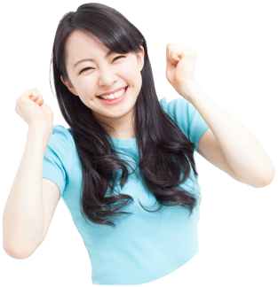 ガッツポーズをする女性